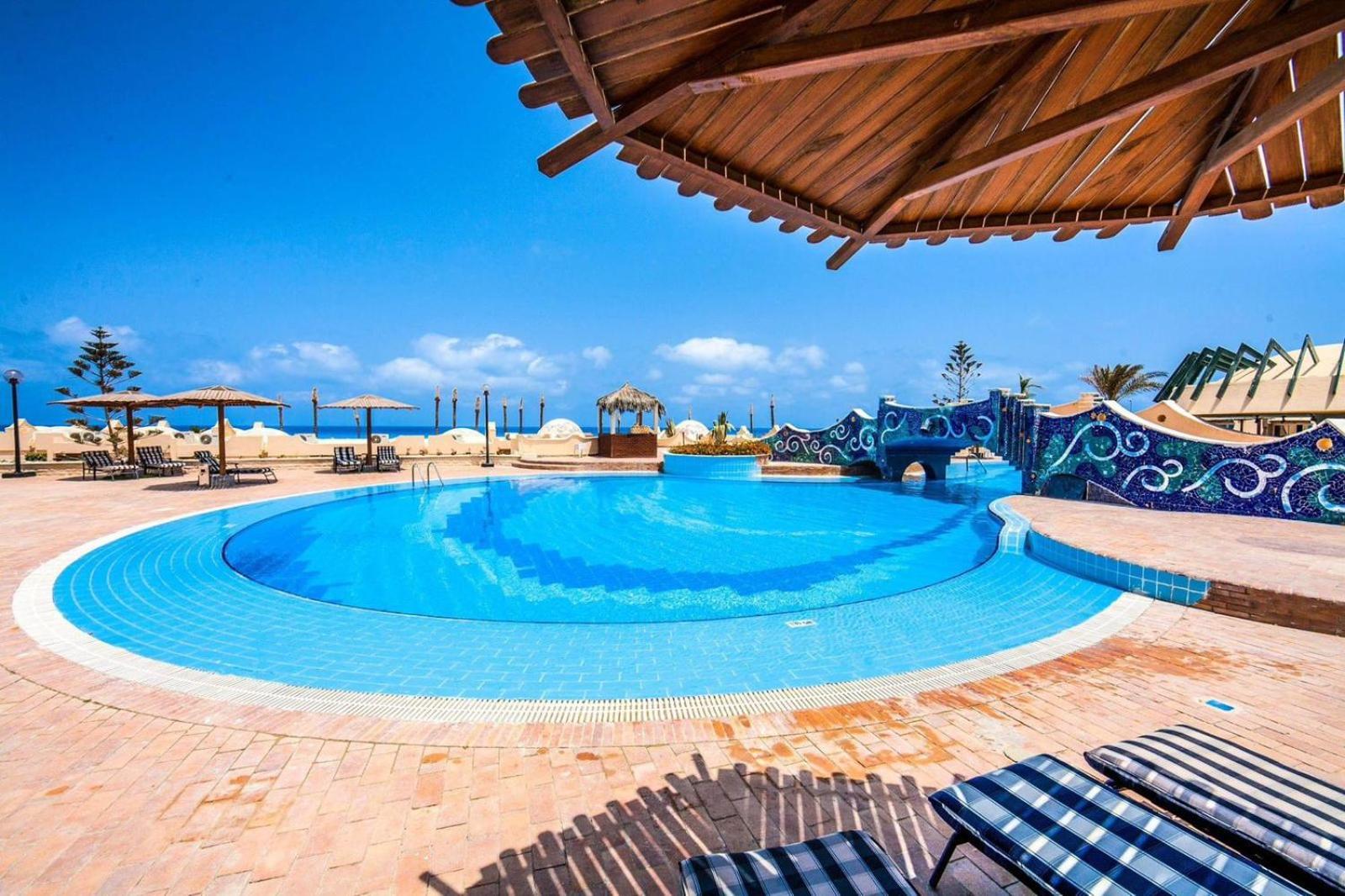 Borg El Arab Beach Resort Екстер'єр фото The swimming pool at the hotel